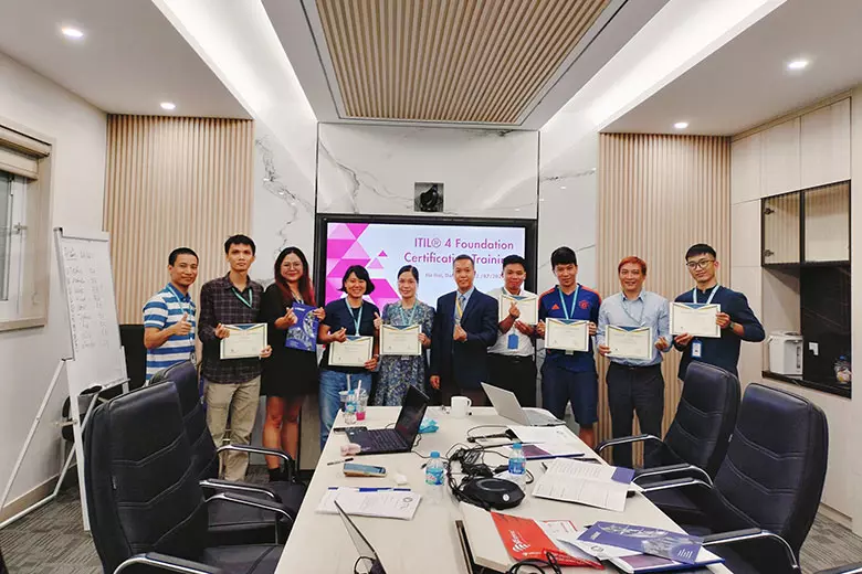 Infochief learners receiving certificates of program completion